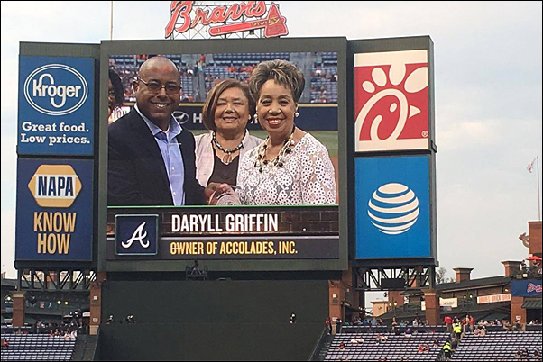 Accolades CEO and Founder Daryll Griffin, MAS (right), accepting the Jackie Robinson Most Valuable Diverse Business Partner Award on behalf of her company.