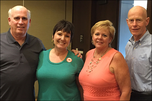 From left are John Mika, director of The Teacher’s Desk; Lesley Walton, manager of gift-in-kind and volunteer coordinator, KINF; Carol Gauger, MAS, and Dave Smith, executive director, KINF. 