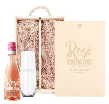 A+ Wine Designs Rosé Gift Set with custom-etched bottle and stemless flute inside a laser-engraved wooden box